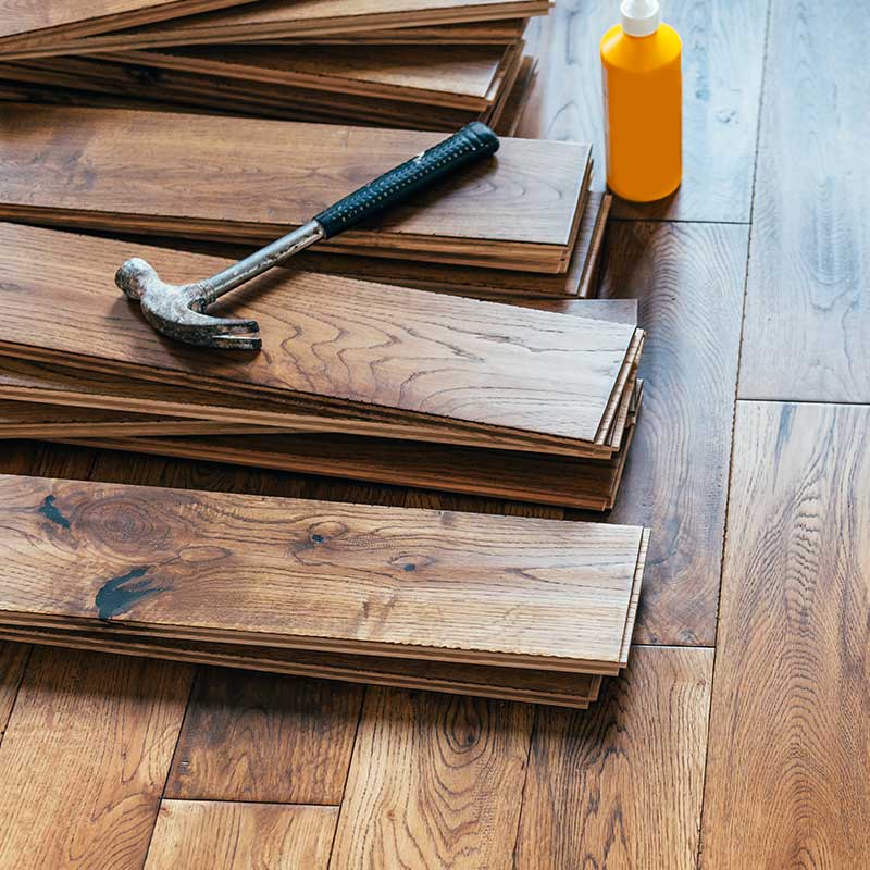 Wooden planks and tools for flooring